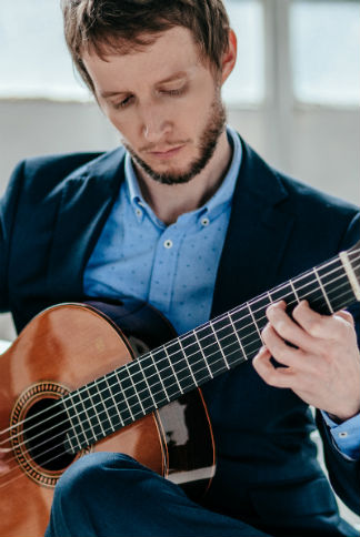 Martin Fogel playing guitar