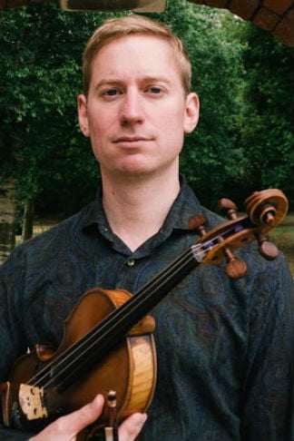  Kit Massey holding a violin