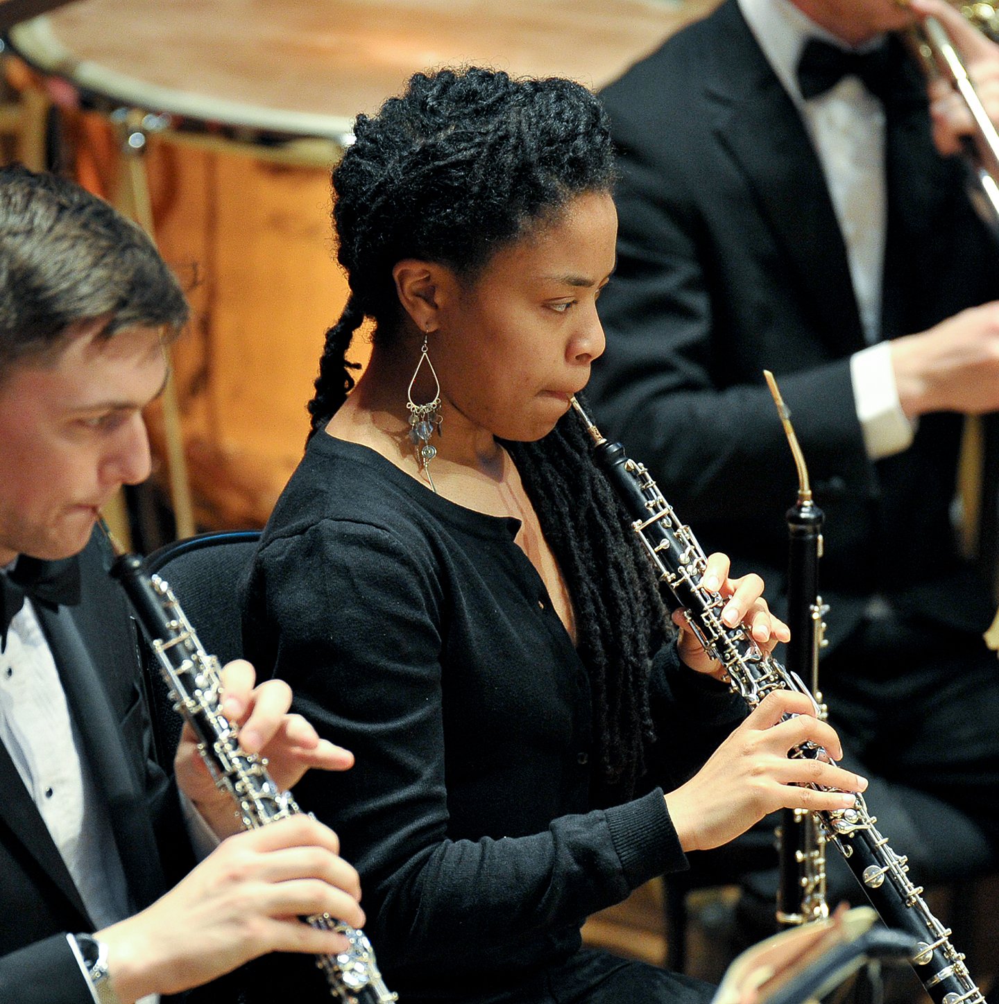 Two oboists performing