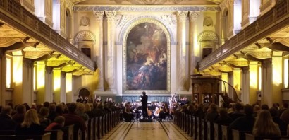 Orchestra performing in ornate chapel