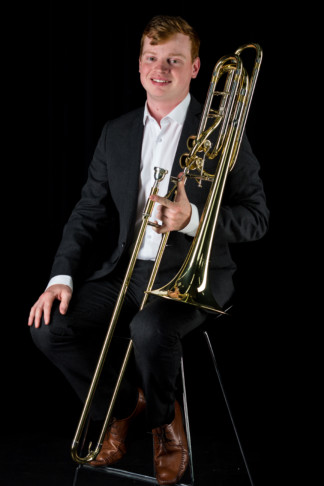 Philip Entwistle holding a trombone