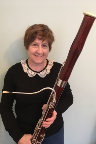 Sue Eversden holding a bassoon