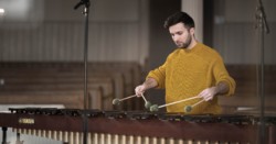 Calum Huggan playing marimba with four mallets