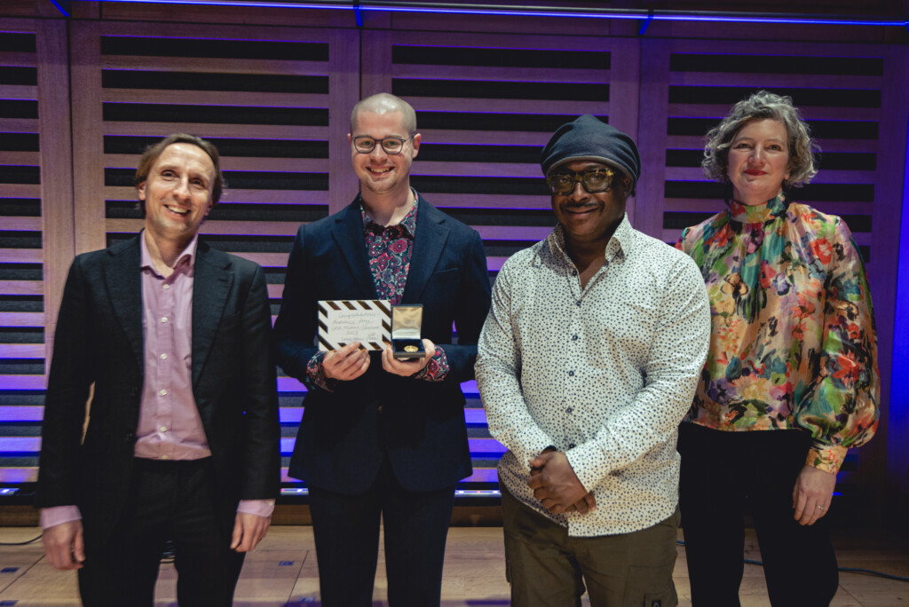 Left to right: Dr. Aleksander Szram, Lewis Chinn, Winston Rollins, Susanna Eastburn MBE at the presentation of the Gold Medal and Audience Prize 2023. Photo: John Hunter